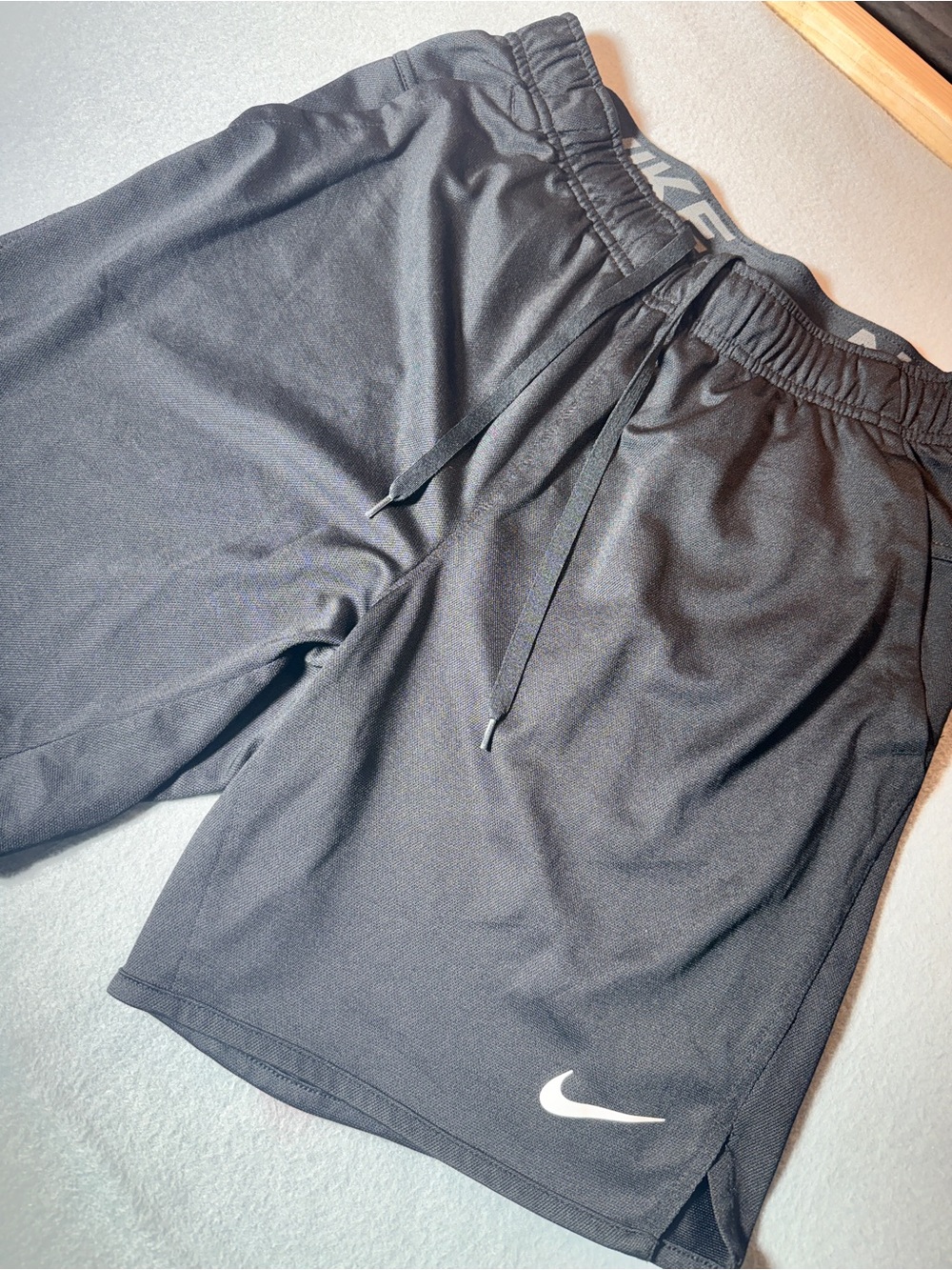 Nike Men’s Black Athletic Training Shorts with White Swoosh